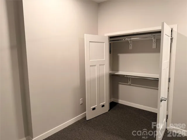 an empty room with closet