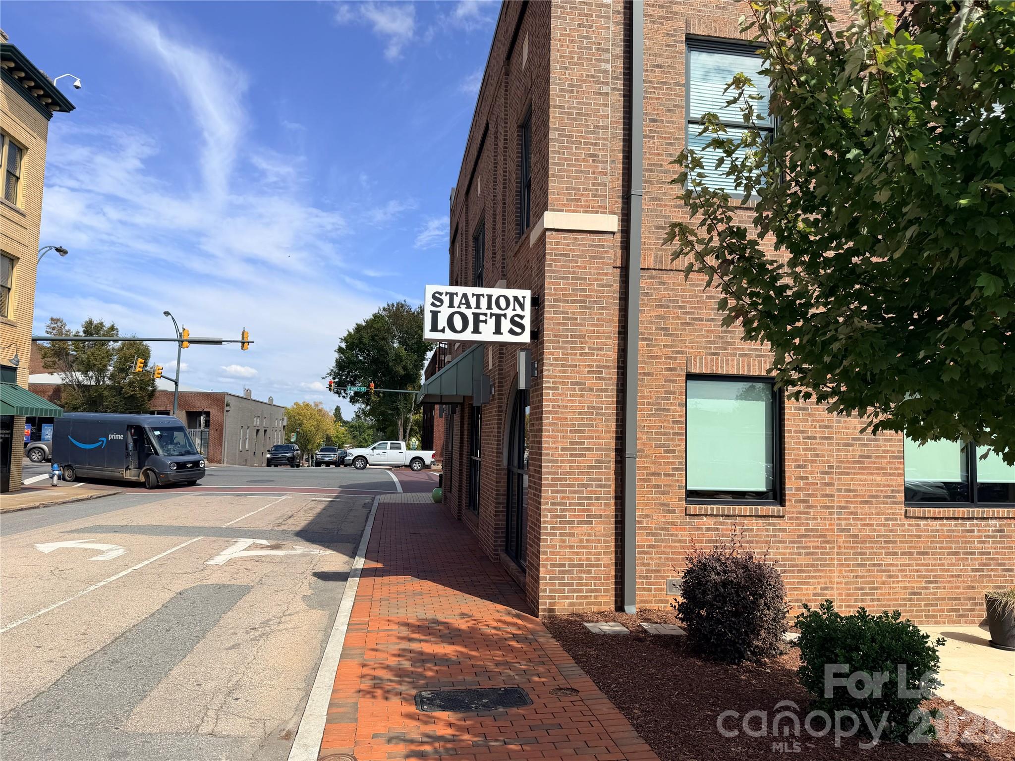 201 East Innes Street, Unit 202 Salisbury, NC 28144 - Photo 3 of 16 a view of a street with cars