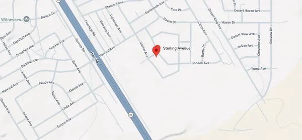 a white bath tub sitting next to a white wall