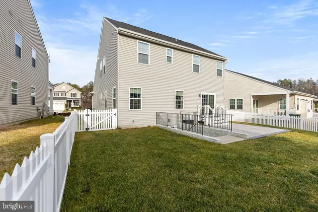 a view of swimming pool with outdoor seating
