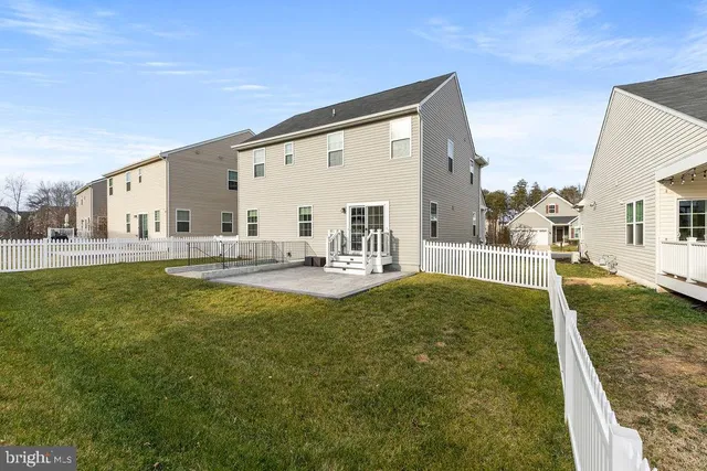 a view of a house with a swimming pool