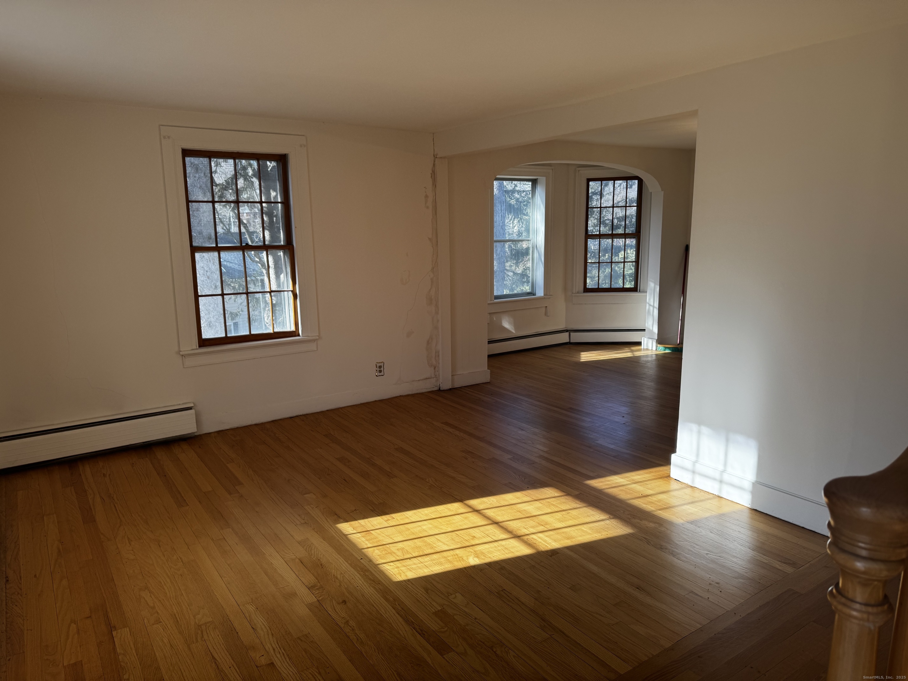 58 Daniels Farm Road Trumbull, CT 06611 - Photo 17 of 40 wooden floor in an empty room with a window