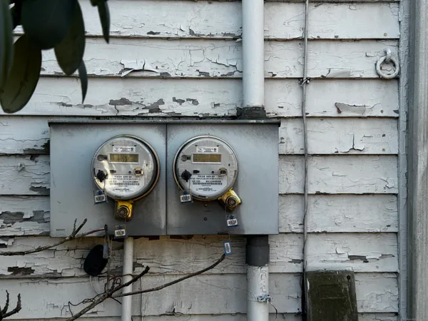 a kitchen with a stove and cabinets
