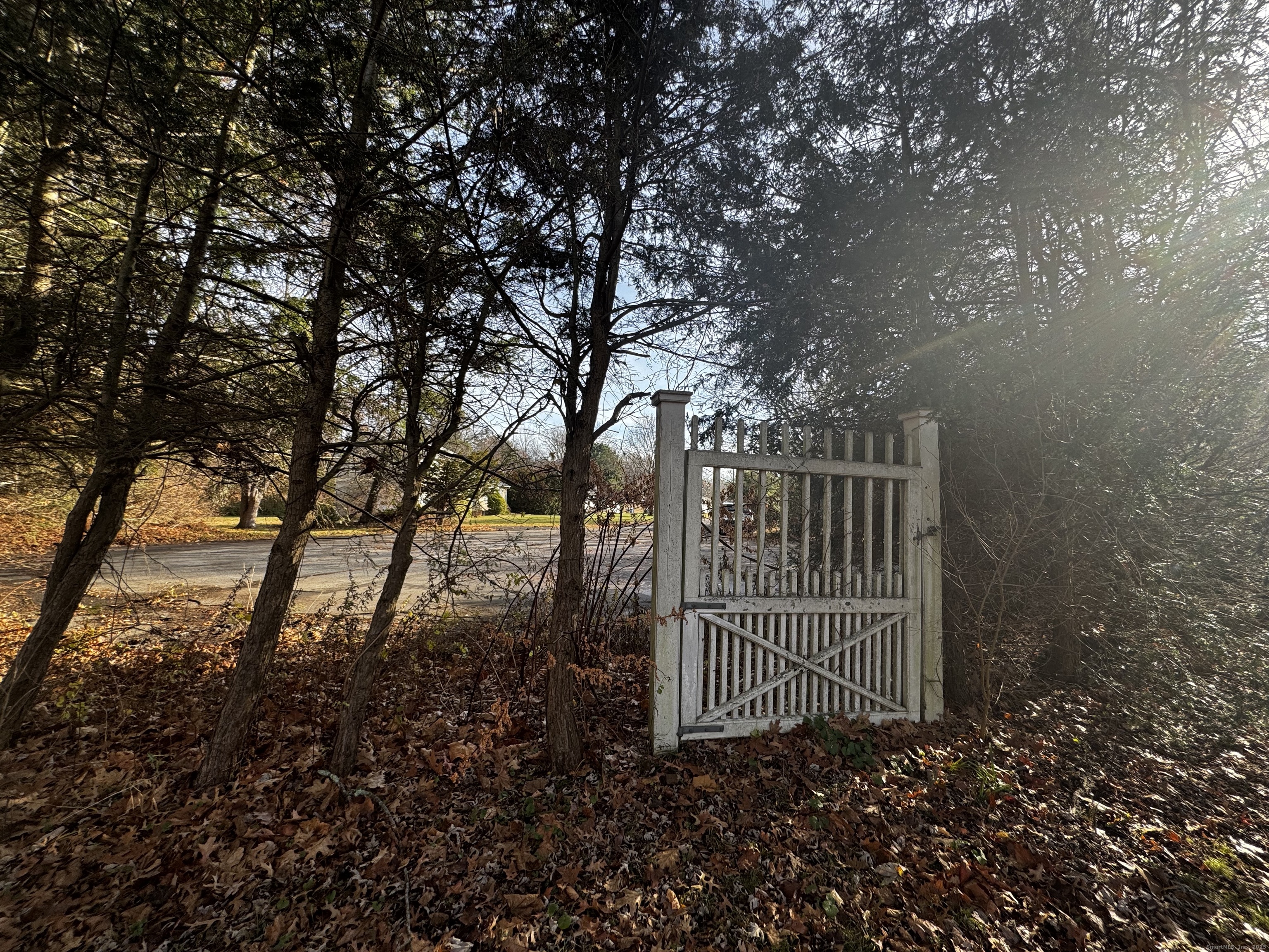 58 Daniels Farm Road Trumbull, CT 06611 - Photo 28 of 40 a view of a gate with pathway