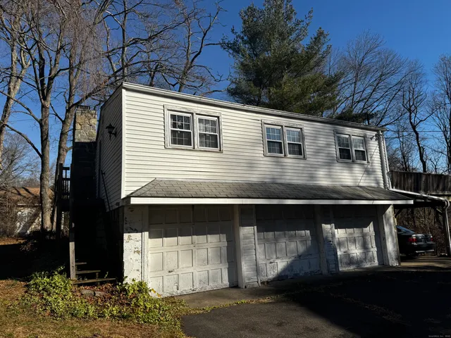 a front view of a house with balcony