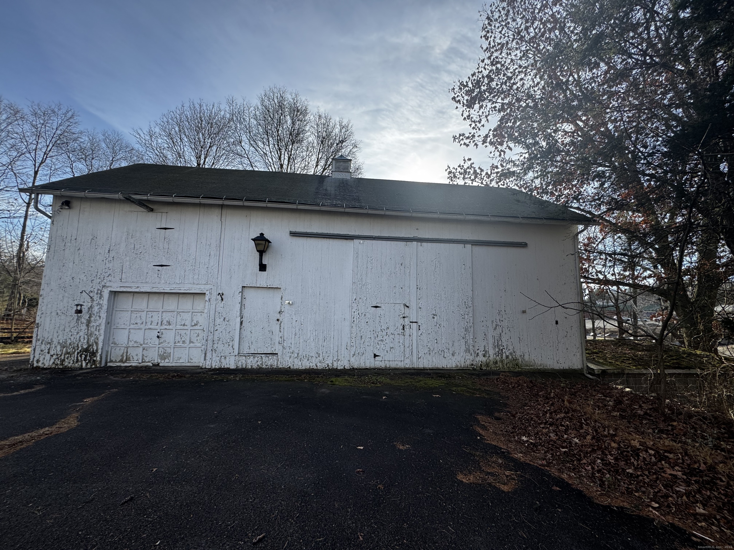 58 Daniels Farm Road Trumbull, CT 06611 - Photo 3 of 40 a view of a small barn