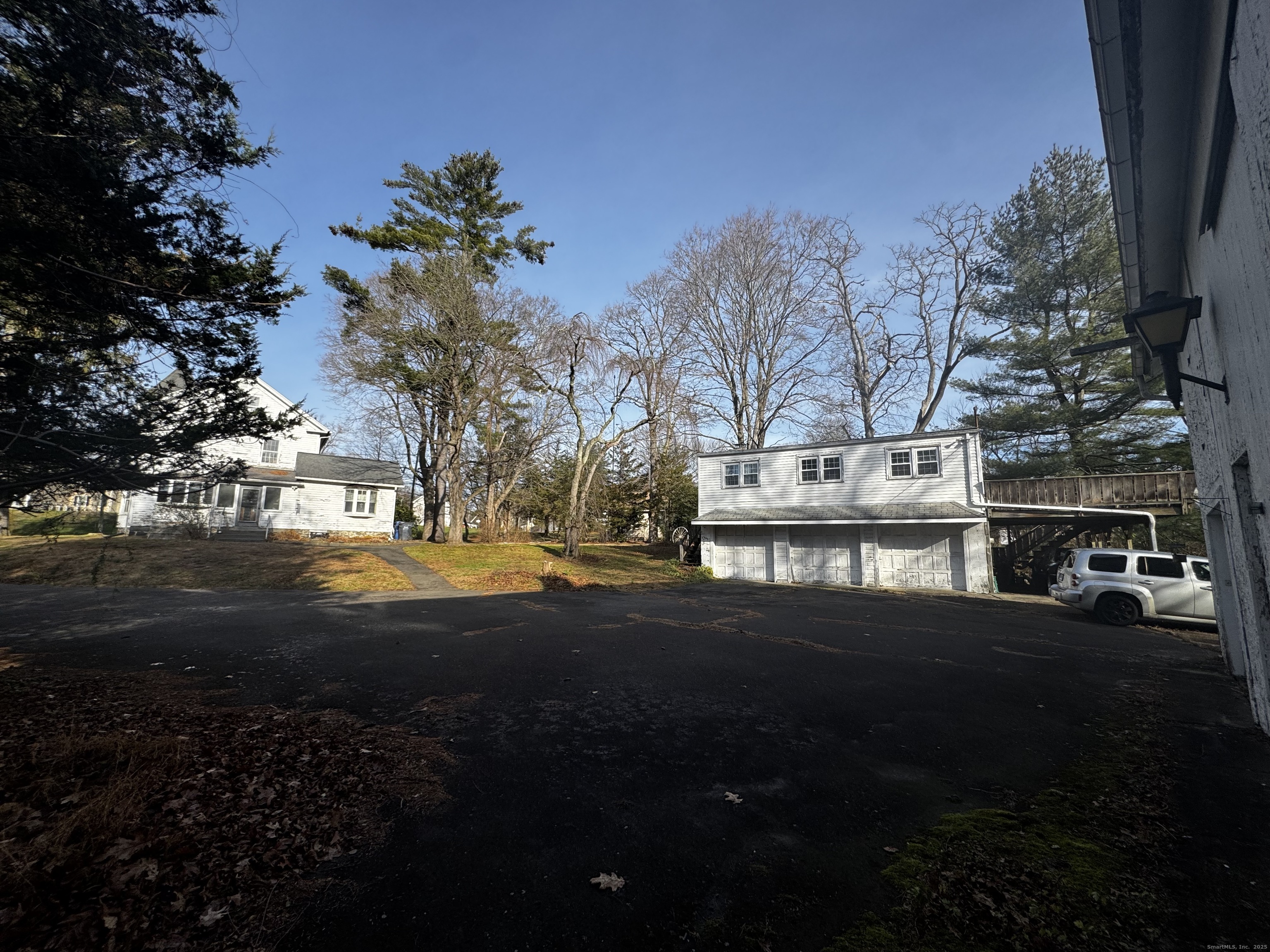 58 Daniels Farm Road Trumbull, CT 06611 - Photo 4 of 40 a view of a street with houses