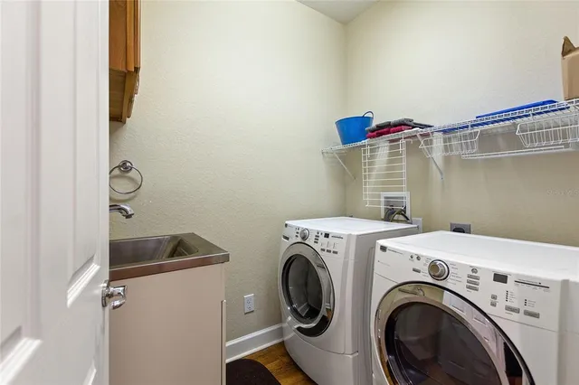 a utility room with dryer and washer