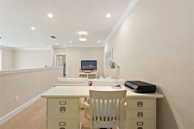 a room with a sink a stove and a table