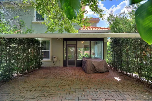 a front view of a house with outdoor space
