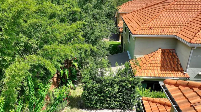 an outdoor view of house with outdoor seating