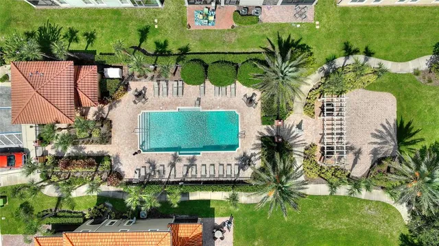 a view of a yard with an outdoor seating area