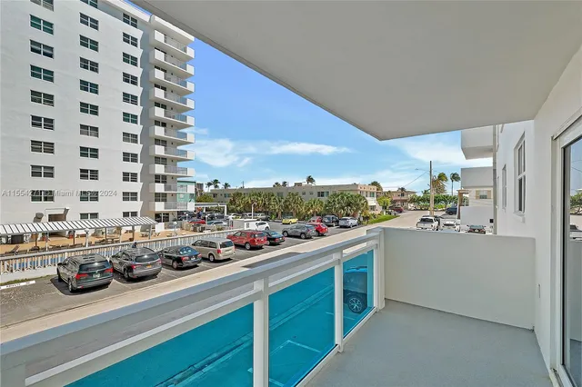 a kitchen with a refrigerator and a stove