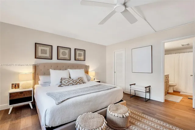 a bedroom with a bed and a couch