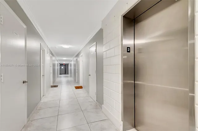 a bathroom with a glass door shower