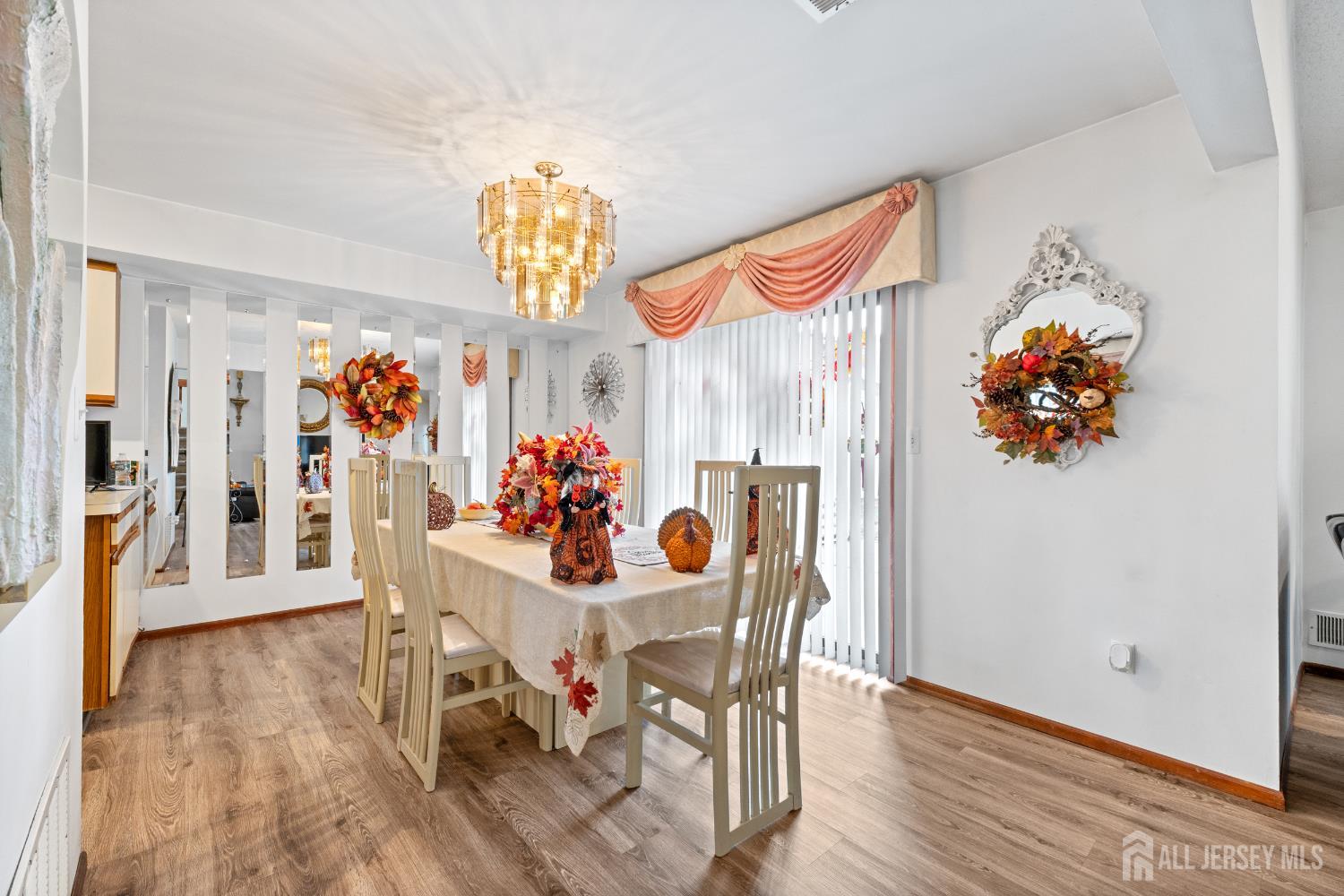 236 Community Circle Old Bridge, NJ 08857 - Photo 13 of 46 a view of a dining room with furniture and wooden floor