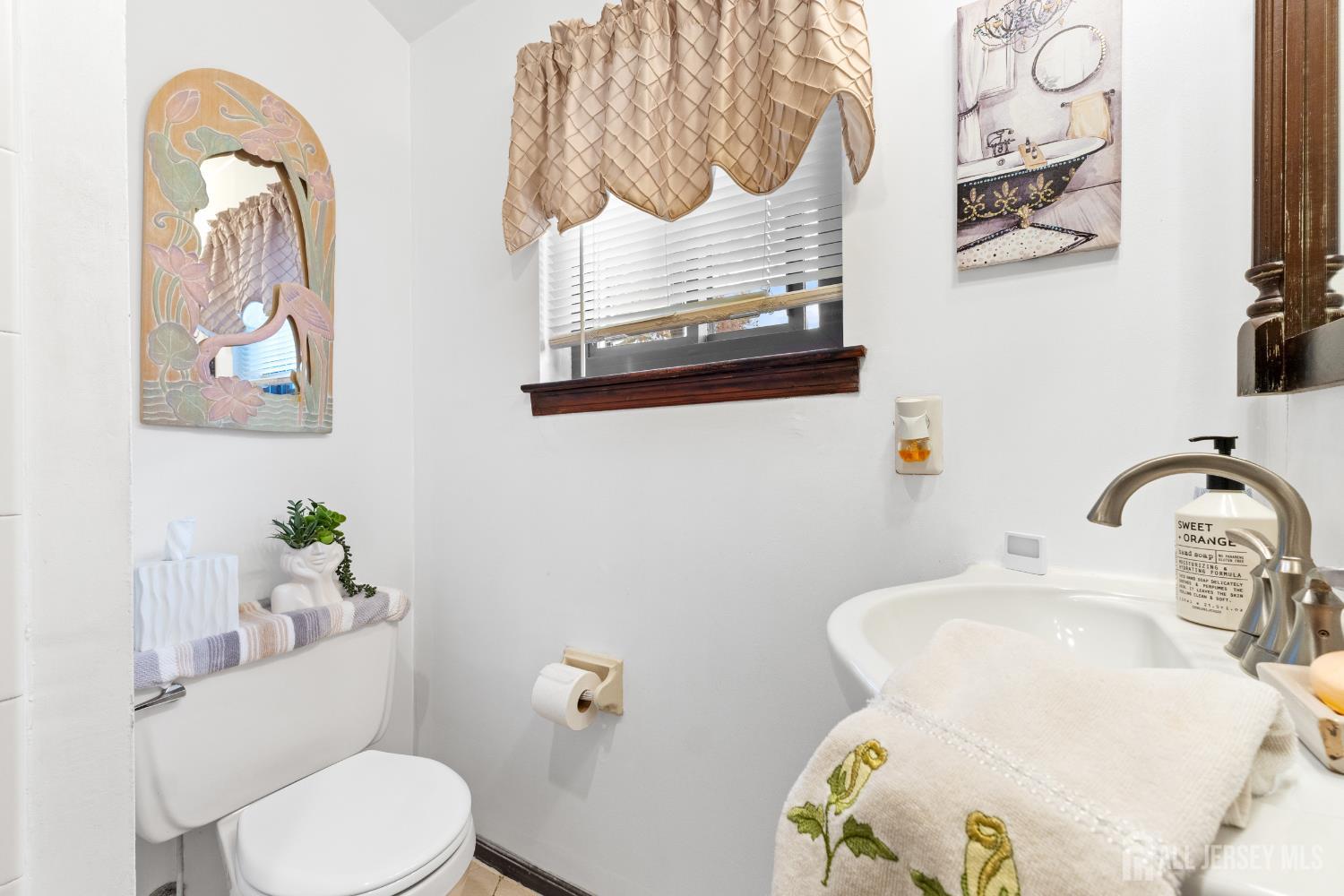 236 Community Circle Old Bridge, NJ 08857 - Photo 24 of 46 a bathroom with a sink mirror vanity and toilet