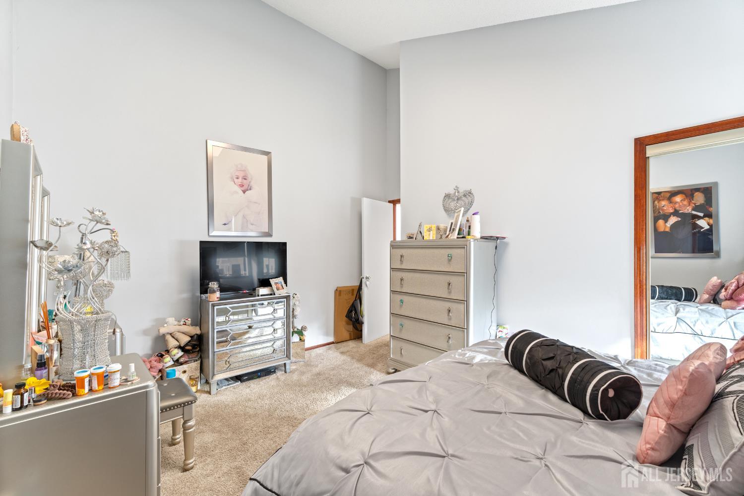 236 Community Circle Old Bridge, NJ 08857 - Photo 29 of 46 a bedroom with a bed and a television