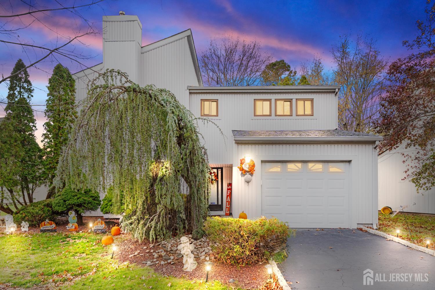 236 Community Circle Old Bridge, NJ 08857 - Photo 46 of 46 a front view of a house with a yard