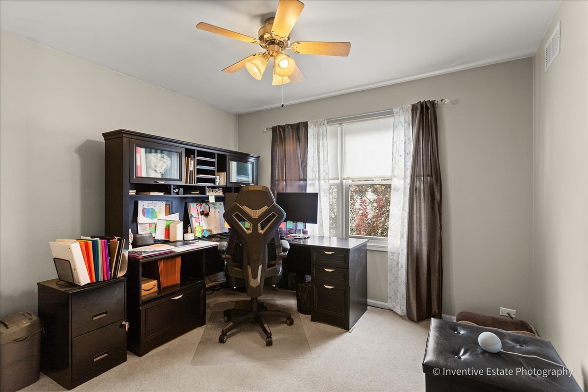 1818 Lobelia Lane Plainfield, IL 60586 - Photo 14 of 19 a view of a workspace with a window and cabinet