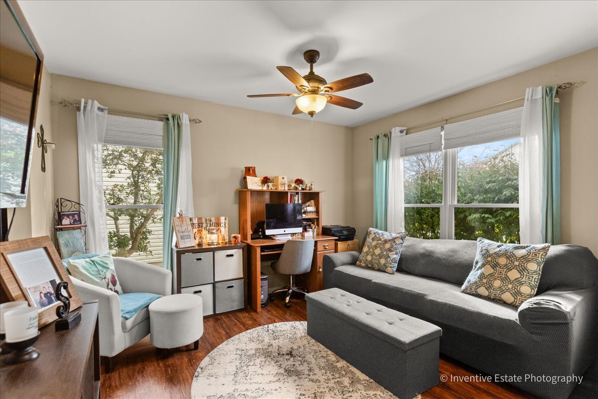 1818 Lobelia Lane Plainfield, IL 60586 - Photo 4 of 19 a living room with furniture and a large window