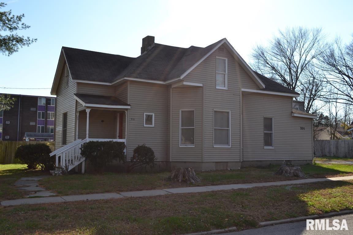 701 West Cherry Street, Unit 1 Carbondale, IL 62901 - Photo 1 of 9 a front view of a house with a yard