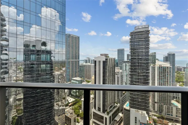 a view of a balcony with city view