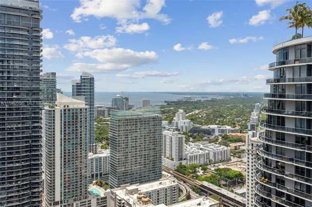 a view of a city with tall buildings
