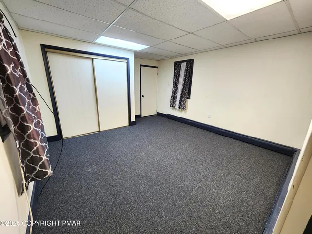 a view of a room with staircase