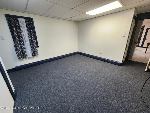 a view of a hallway with staircase