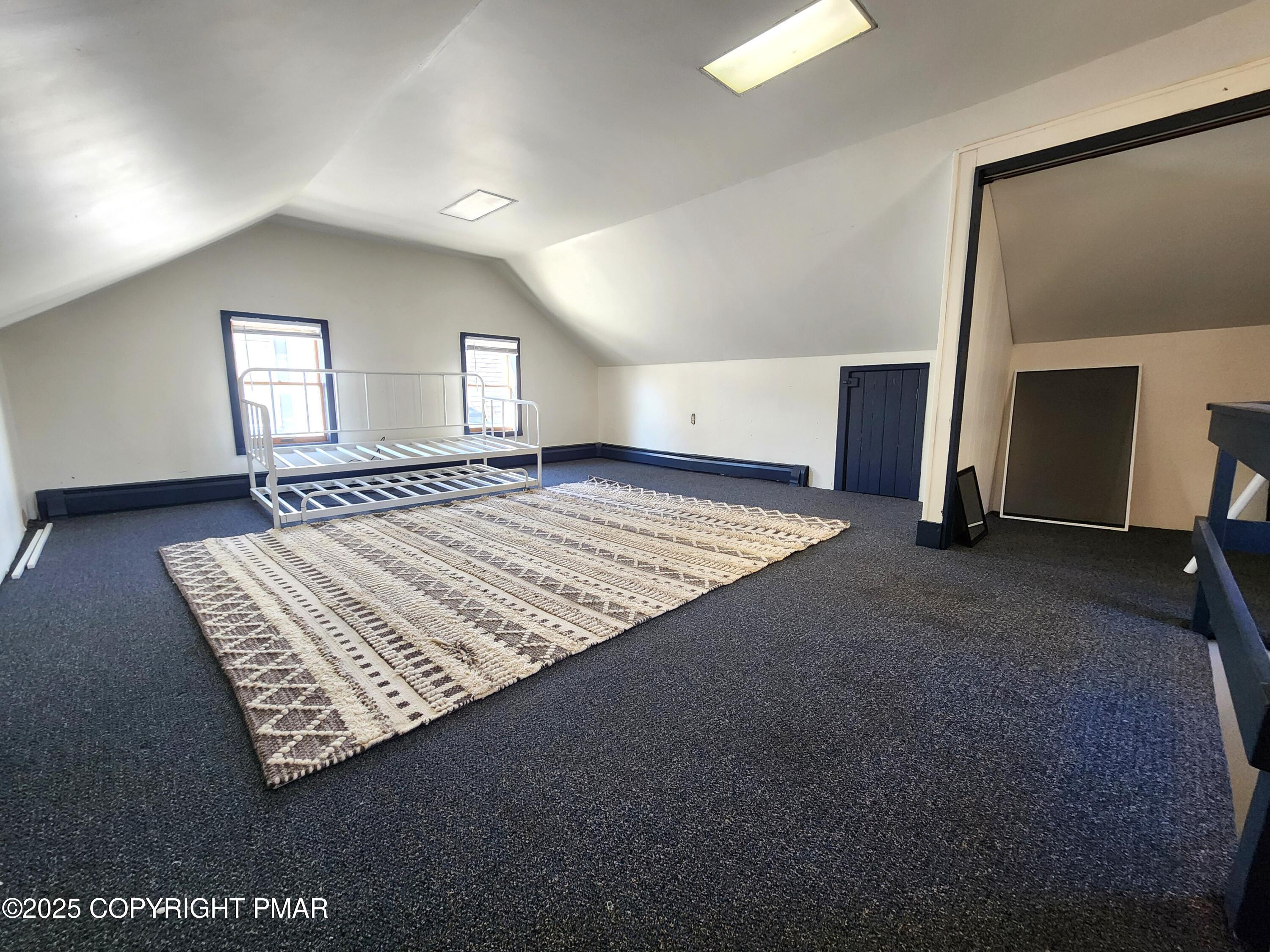 514 North Street Jim Thorpe, PA 18229 - Photo 26 of 34 a view of an empty room with window and hardwood