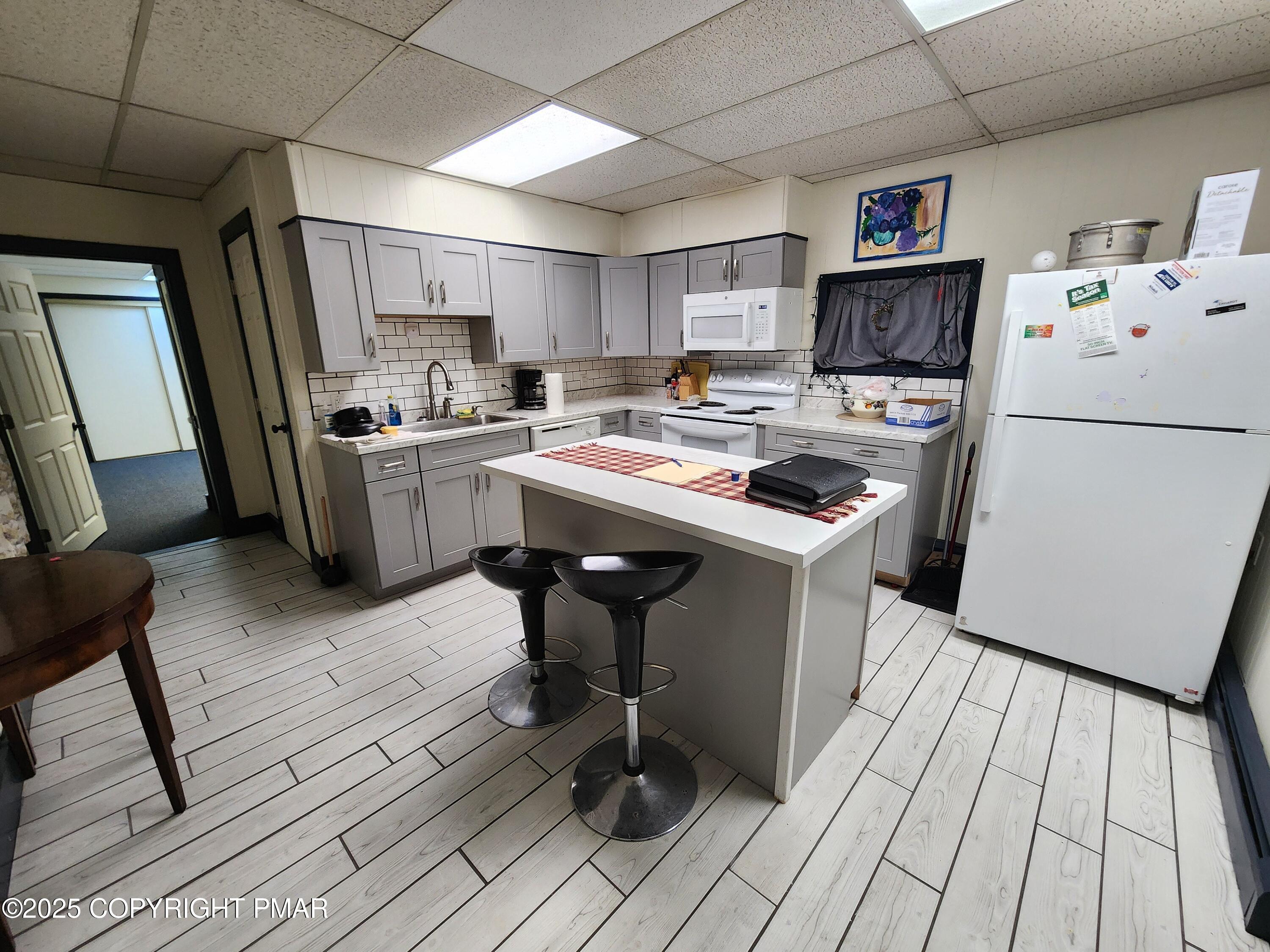 514 North Street Jim Thorpe, PA 18229 - Photo 6 of 34 a kitchen with a sink appliances and cabinets