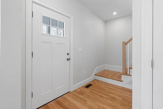 a room that has a bed and a window