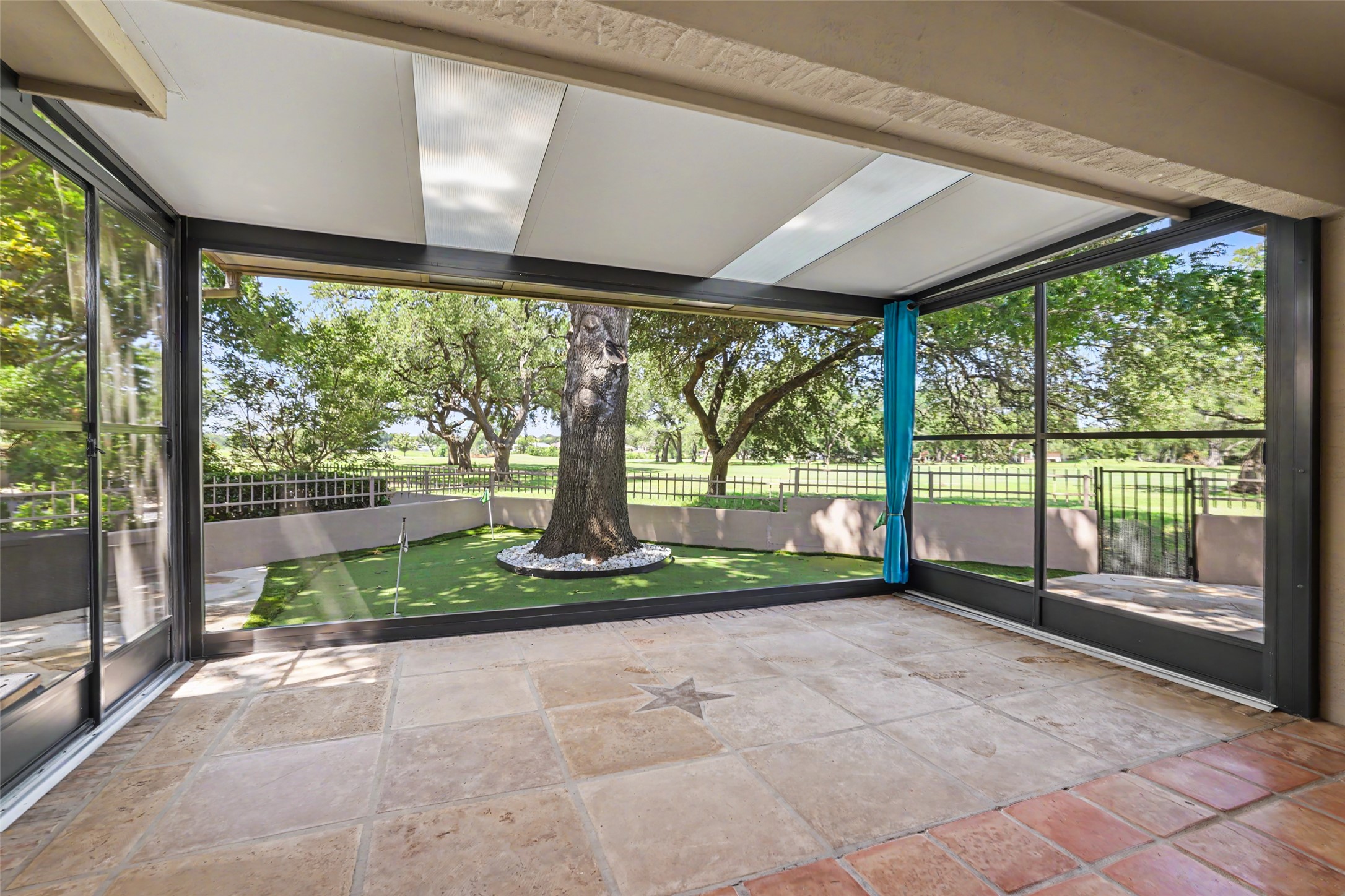 30107 Hamlet Circle Georgetown, TX 78628 - Photo 25 of 40 An enclosed patio offers a private putting green with golf course views.