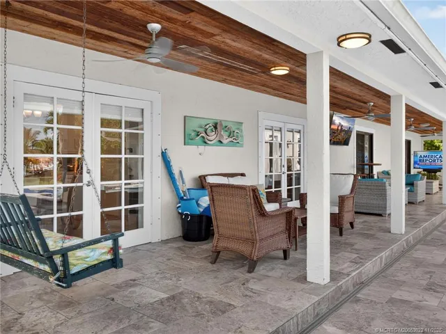 a view of a chairs and table in a room