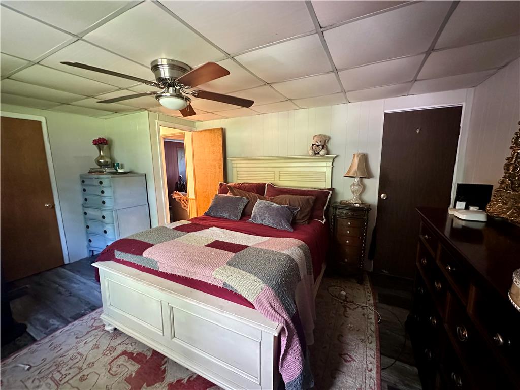 381 Red Oak Lane Bath, PA 18014 - Photo 13 of 27 A comforting bedroom features a ceiling fan, a spacious bed, and ample natural light.