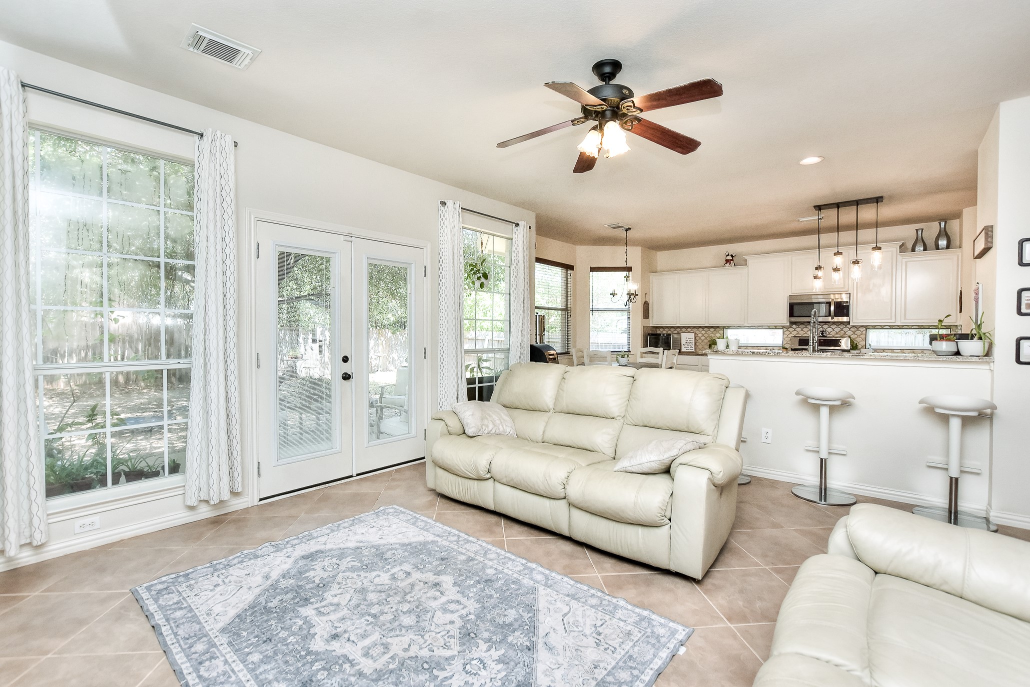 455 Logan Road Georgetown, TX 78628 - Photo 15 of 38 French doors open to back yard.