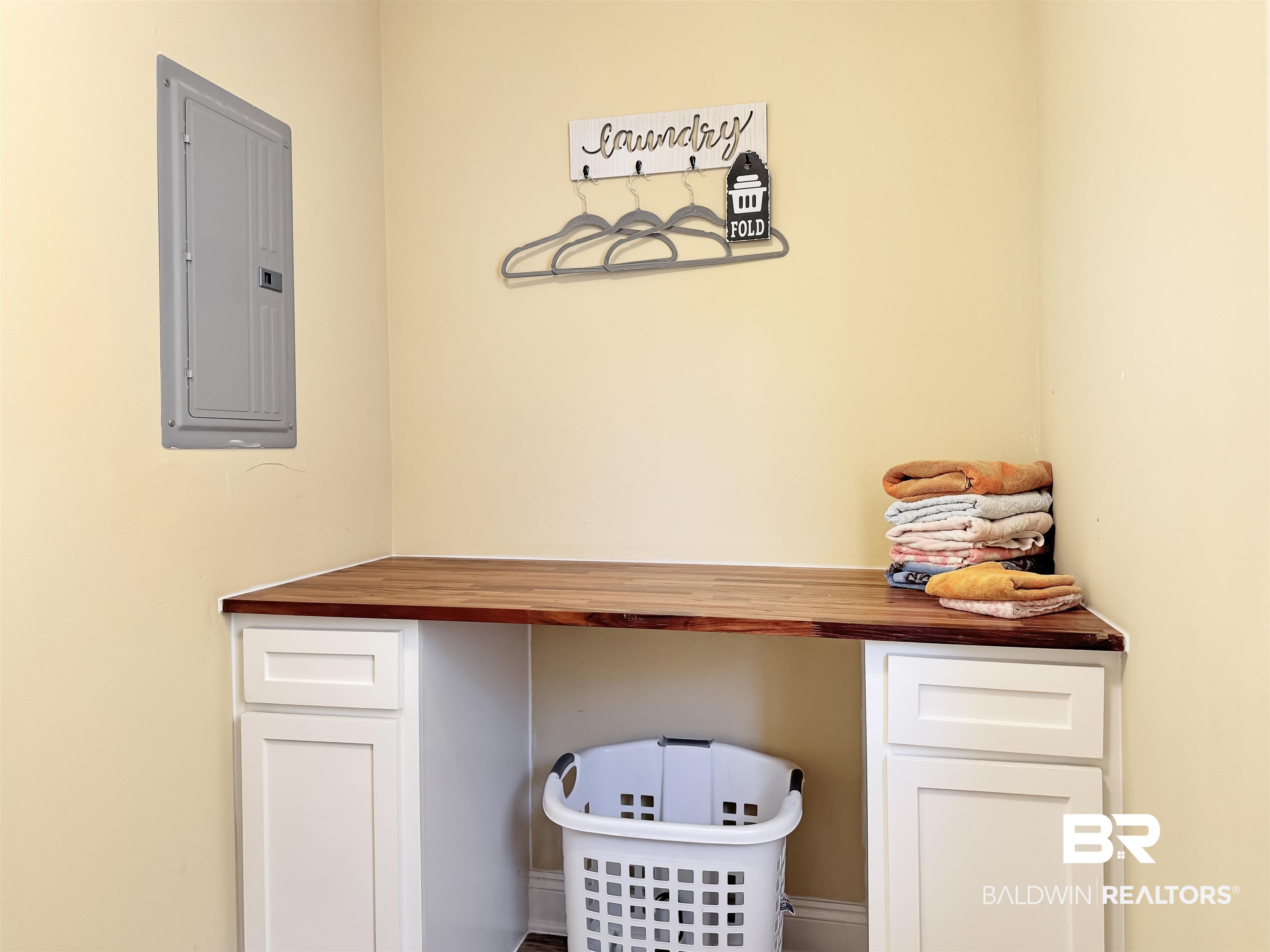 30687 Brady Road Robertsdale, AL 36567 - Photo 34 of 53 Custom cabinetry with sealed butcher block / folding countertop.