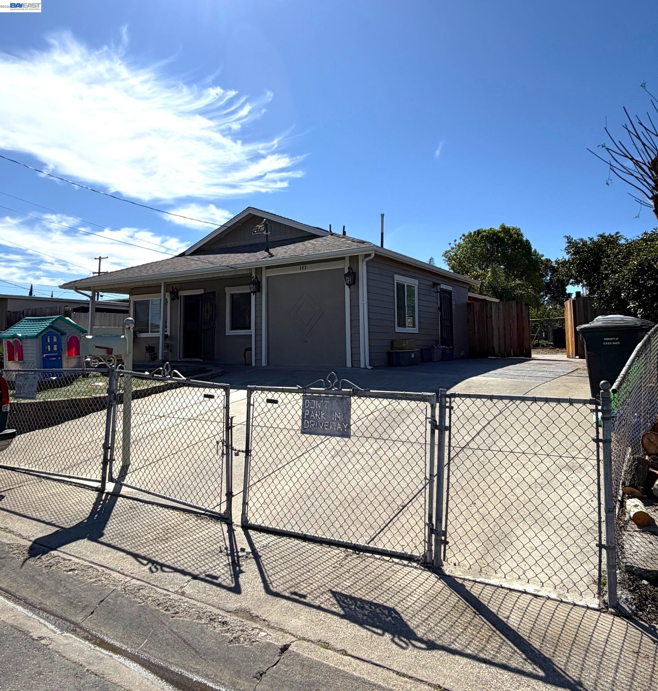 143 Peninsula Road Bay Point, CA 94565 - Photo 2 of 2 a view of a house with wooden fence