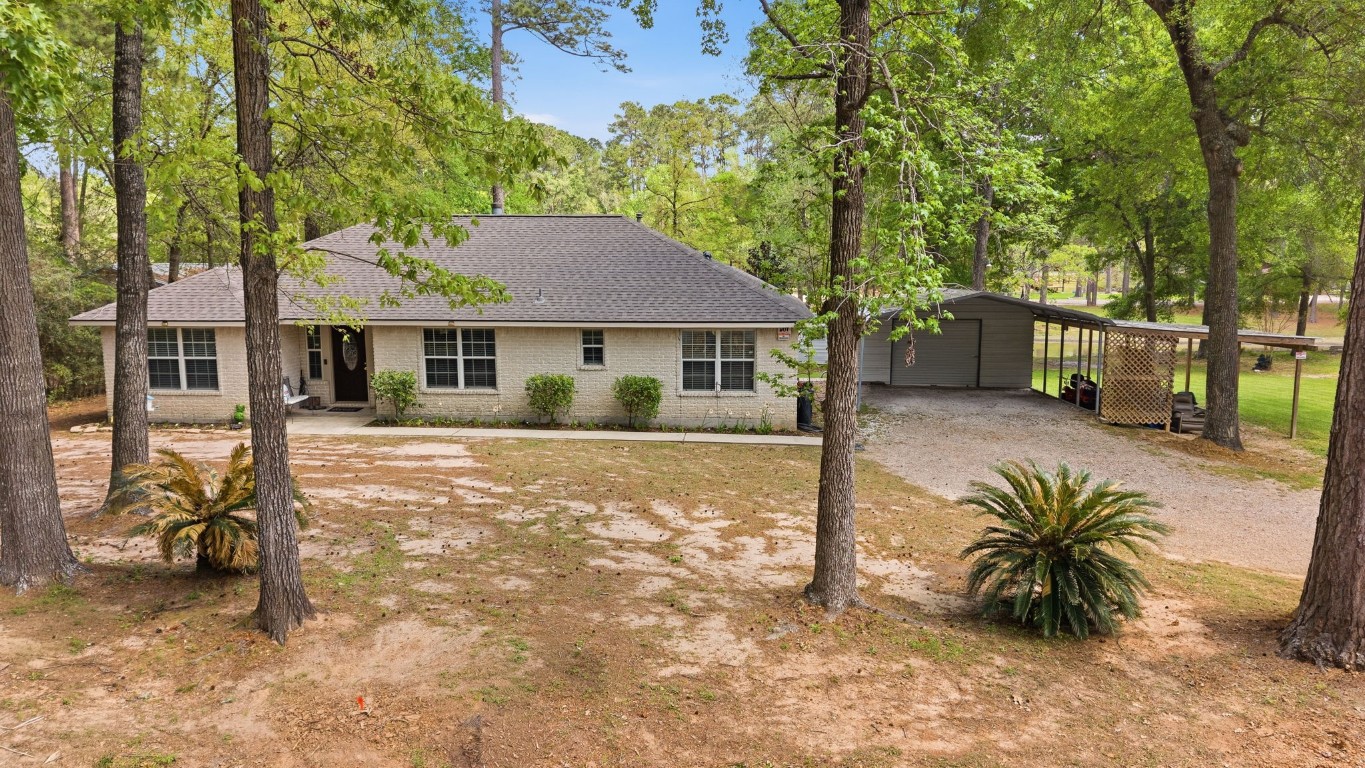 907 Columbia River Road Montgomery, TX 77316 - Photo 27 of 34 a view of a house with a outdoor space