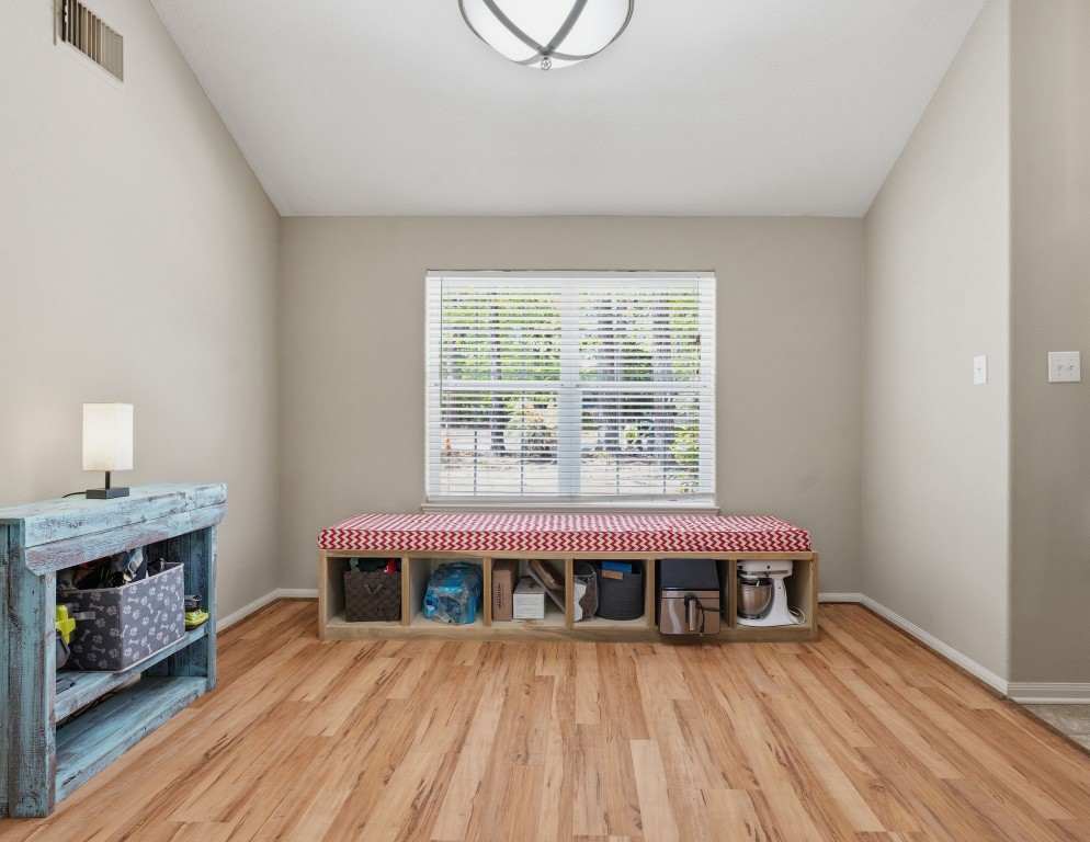 907 Columbia River Road Montgomery, TX 77316 - Photo 7 of 34 a view of a room with wooden floor and fireplace
