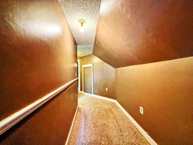 a house view with a backyard space