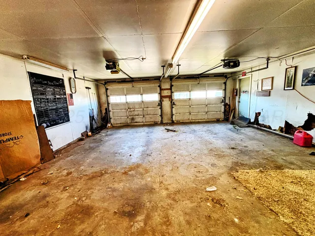 a room with furniture and gym equipment