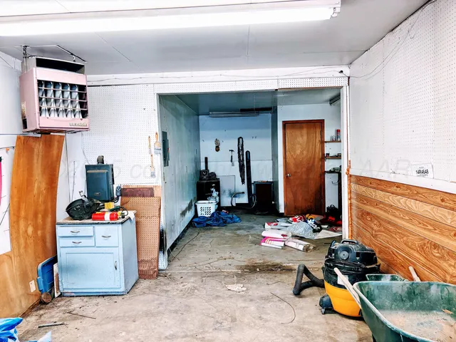 a room with a sink and a toilet