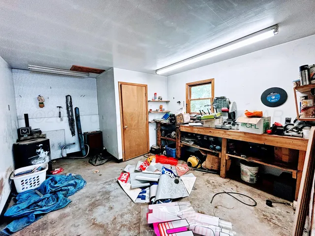 a room with storage and utility room