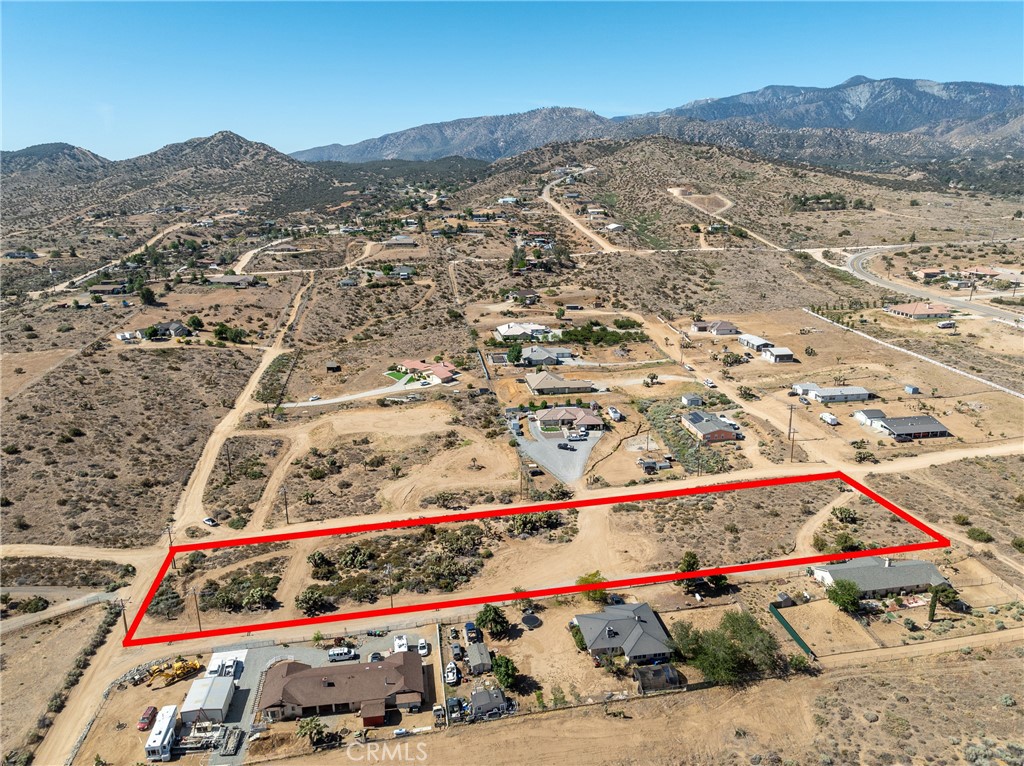 a view of outdoor space with mountain view