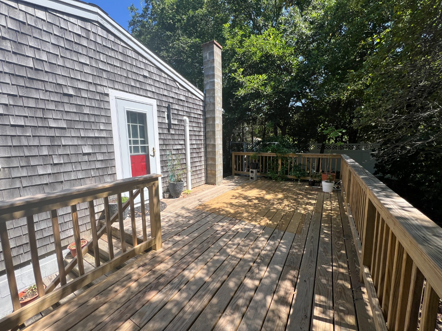 67 12th Street Edgartown, MA 02539 - Photo 20 of 23 a view of house with backyard and sitting area