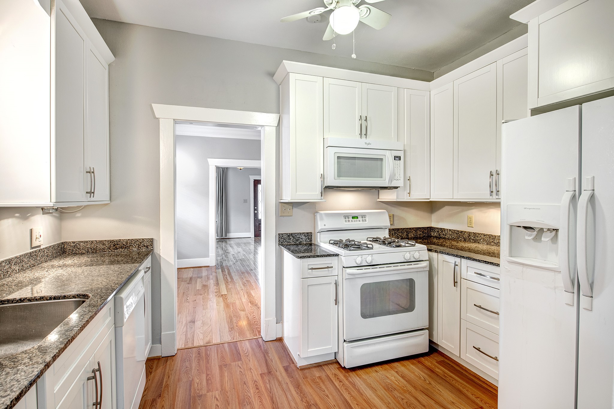 2219 Singleton Street Houston, TX 77008 - Photo 6 of 21 Kitchen with gas range and granite counters.