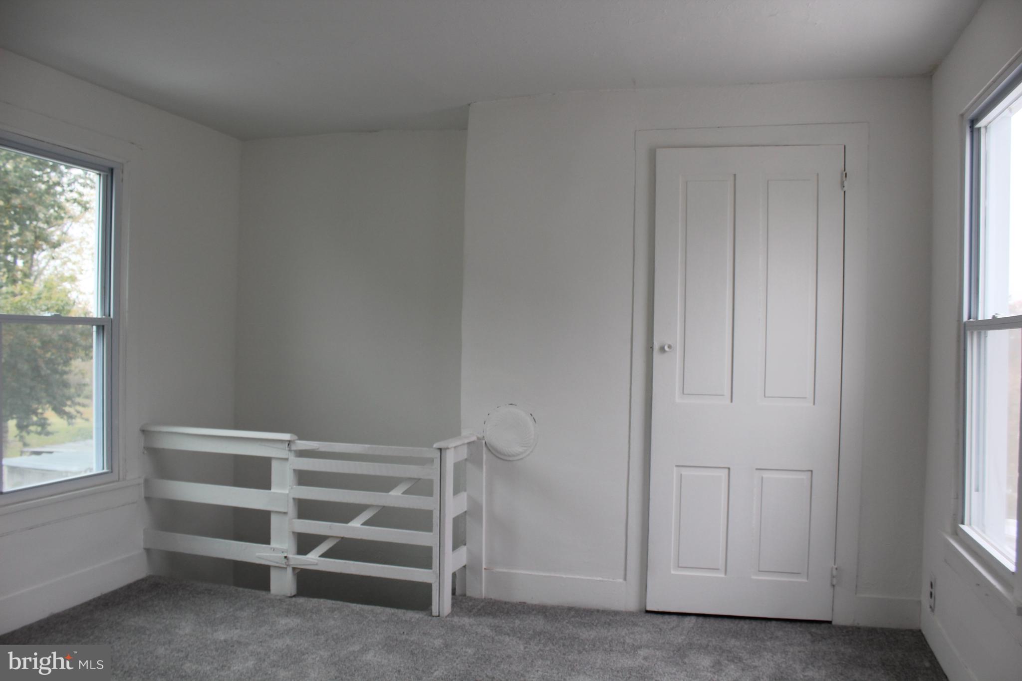150 Main Street Dover, DE 19901 - Photo 27 of 50 a view of an empty room and a window