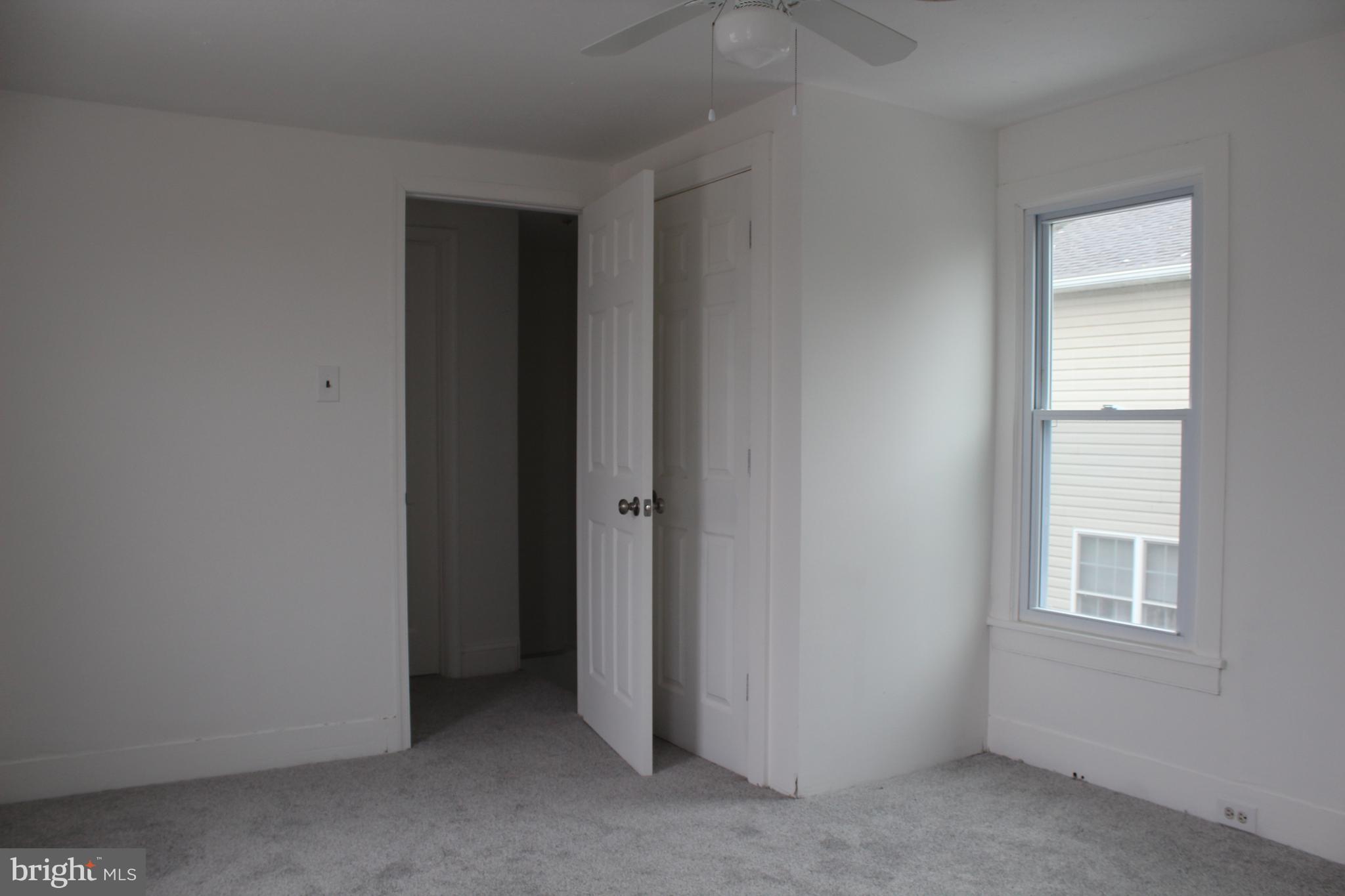 150 Main Street Dover, DE 19901 - Photo 29 of 50 a view of an empty room with a window